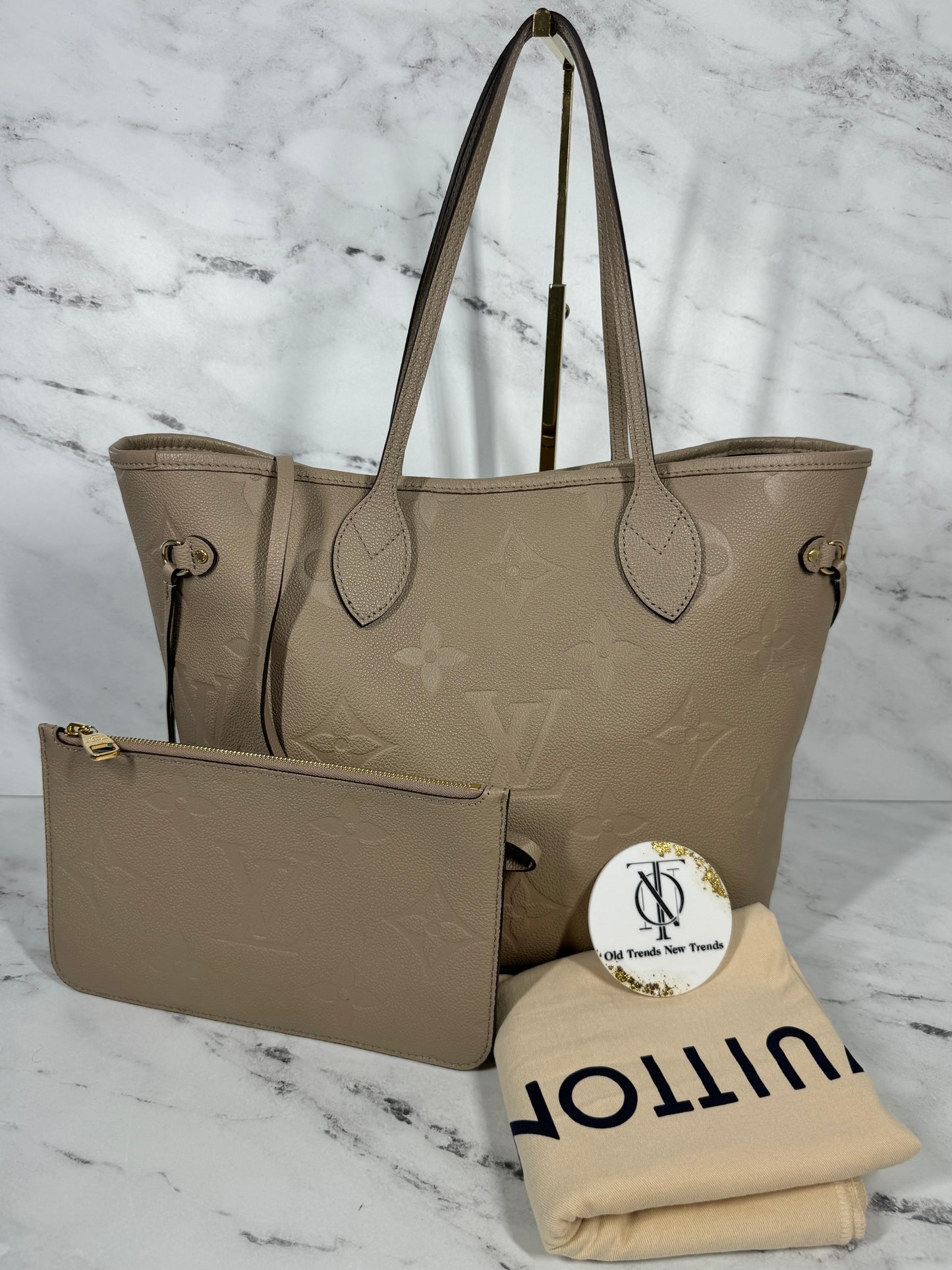 Louis Vuitton Tourterelle Monogram Empreinte Leather Neverfull MM