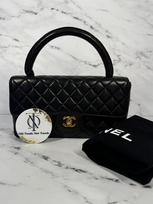 Chanel Vintage 90s Black Quilted Lambskin Medium Kelly Top Handle Parent Flap Bag w 24K Gold Plated Hardware