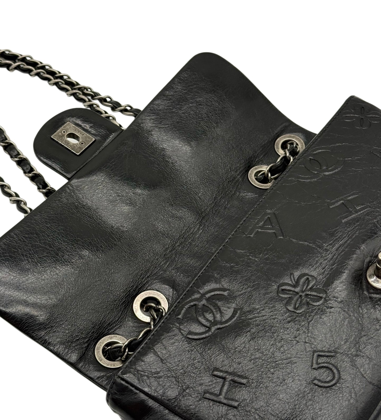Chanel 2014 Black Calfskin Embossed Precious Symbols Medium Classic Flap with Ruthenium Hardware