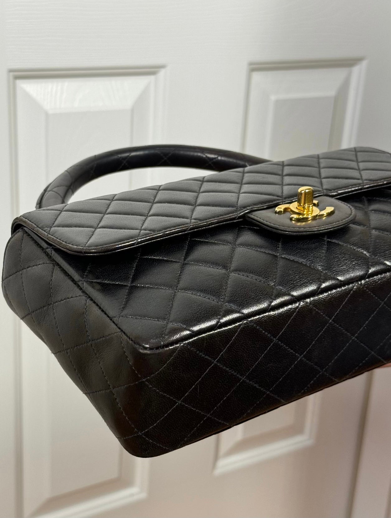 Chanel Vintage 90s Black Quilted Lambskin Medium Kelly Top Handle Parent Flap Bag w 24K Gold Plated Hardware