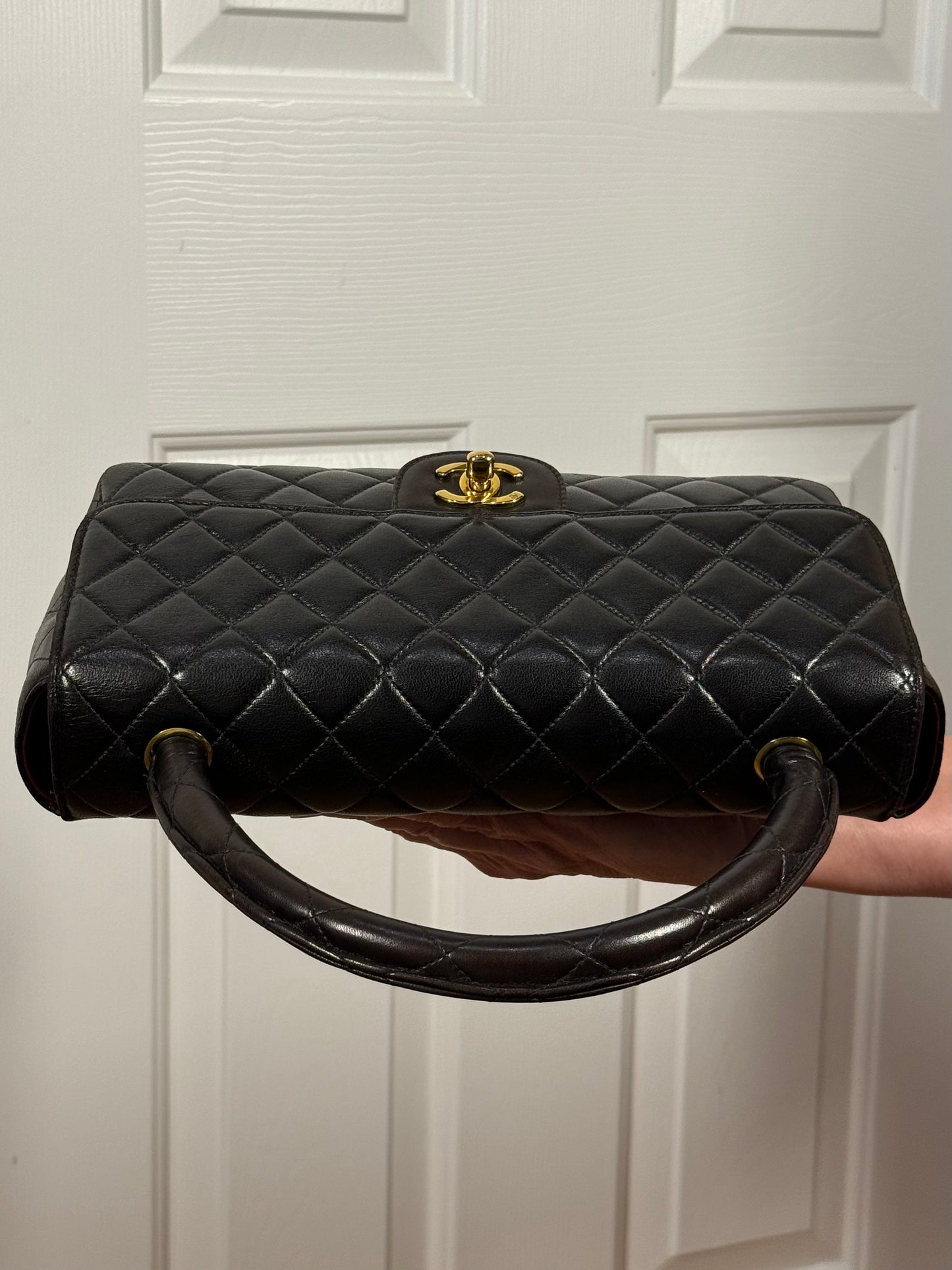 Chanel Vintage 90s Black Quilted Lambskin Medium Kelly Top Handle Parent Flap Bag w 24K Gold Plated Hardware